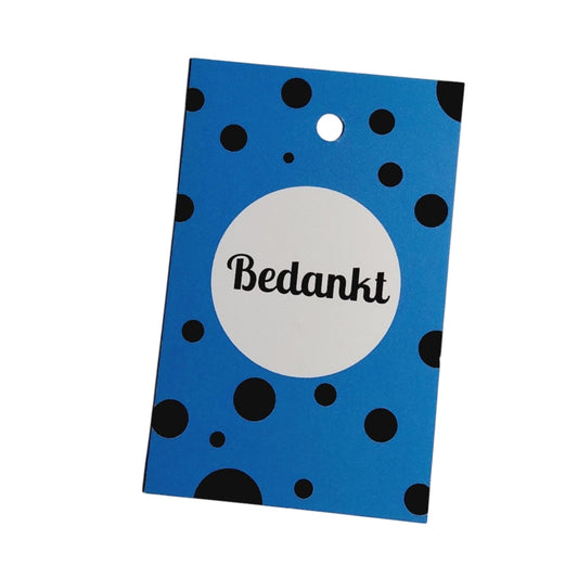 Label blauw met stippels met tekst bedankt