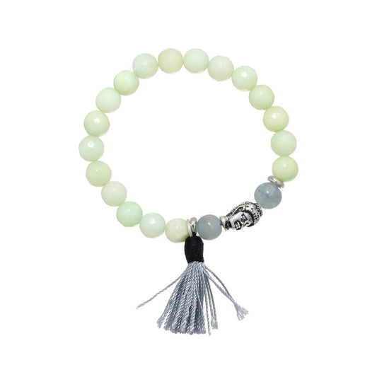 Lichtgroen armbandje met boeddhabedel en kwastje