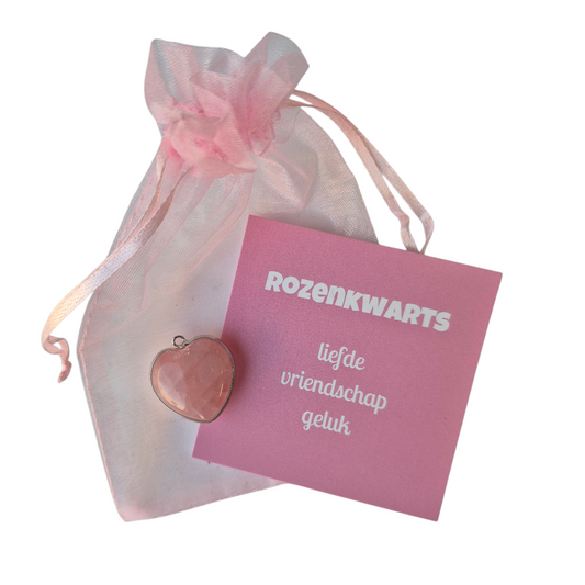 Haartje van rozenkwarts met zilverkleurig randje