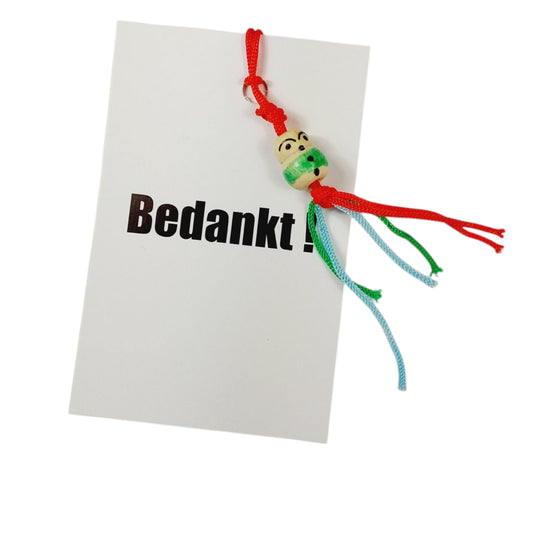 Kaartje bedankt met gelukspoppetje