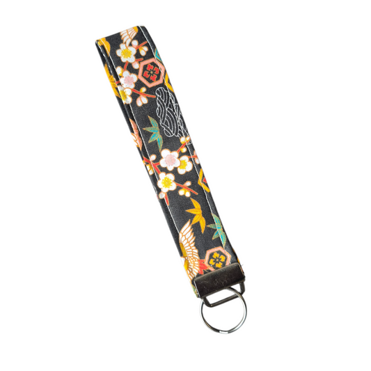 Sleutelhanger cherry blossoms zwart met kraanvogel
