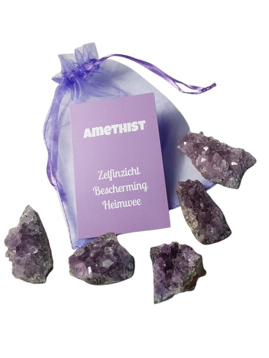 Amethist steen met zakje en uitleg werking